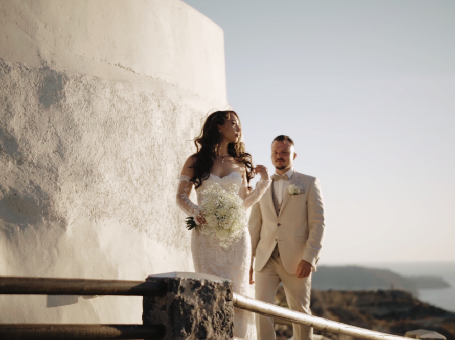 Anastasia and Robert dancing at their wedding reception at El Viento Santorini